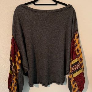 Boho waffle knit top with patterned sleeves
